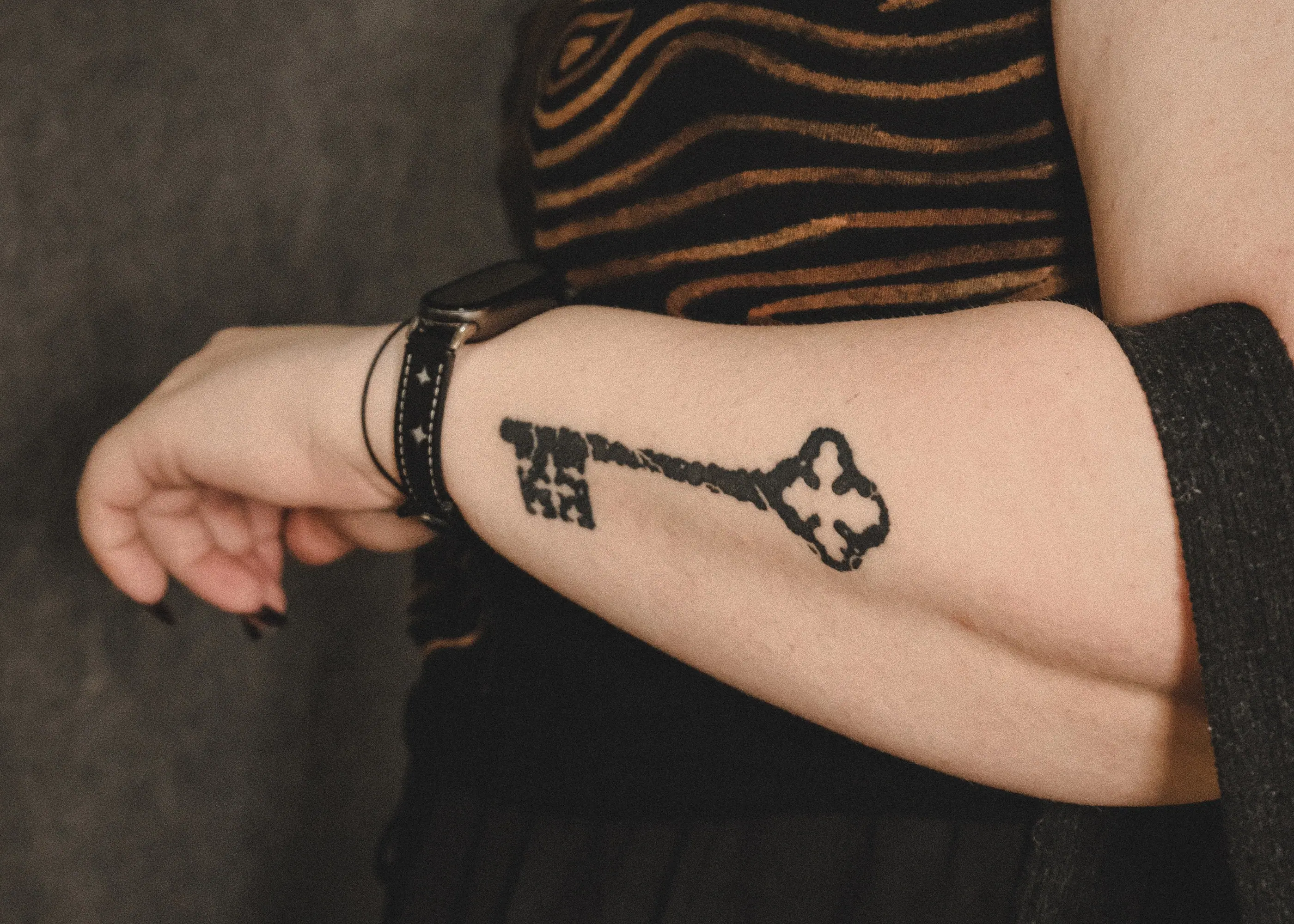 A key tattooed on a forearm, five months healed